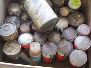 lot 52 image: box of vintage oil cans