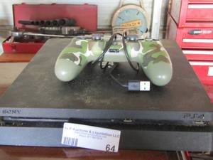 lot 64 image: PS4 with 1 control no cords included