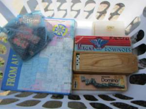lot 107 image: Keller high school year book and various sets of dominoes