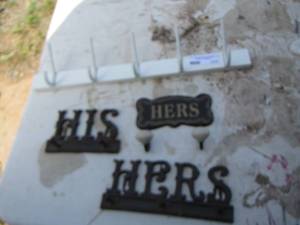 lot 117 image: His and hers wall hangers for keys are coatsjackets