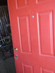 lot 156 image: Solid red wood door