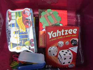 lot 208 image: pink tote of games 