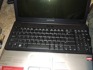 lot 138 image: Compass 15-- windows 7 LAPTOP in case no cord