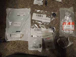 lot 231 image: Polaris parts, ball end max1, cover fill neck atv, tank gasket pivot ball. Reserve tank cap x 2 Honda - spring , part # 24720-mfl-305
