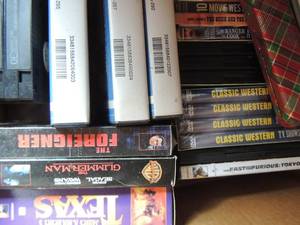 lot 266 image: dvd plus vhs tapes