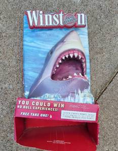 lot 21 image: Way cool vintage collectible old advertising - JAWS Winston Ad still in original box