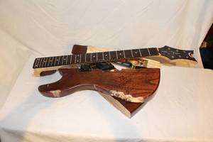lot 1 image: WOW  Signed BIG N RICH guitar - stage played, stage destroyed