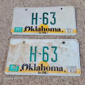 lot 100 image: Vintage 1983 Oklahoma License Plate Pair