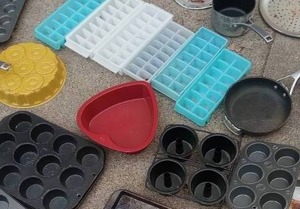 lot 108 image: Cupcake Pans, Ice Trays, and Platters Oh My