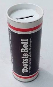 lot 56 image: Collectible vintage Tootsie Roll Piggy Bank with lot of unsearched coins - quarters, dimes, nickels and pennies