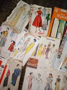 lot 284 image: Large Lot of Vintage Sewing Patterns, Tracing Paper, McCalls Magazine, and How To Books
