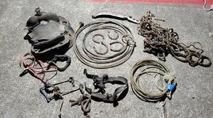 lot 116 image: Vintage Giddy Up Lot - lassoes, horseshoes, horse hame, stirrup, old saddle, harnesses, rope lots of stuff as shown