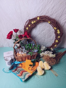 lot 64 image: Decorative Set w Wreath, Floral Deccor, Mug, Material Banner Flags, Basket, Decorative Bells, Golden Balls, Etc