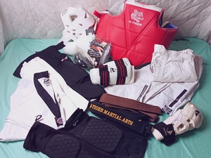 lot 36 image: 13 Pc Martial Arts Protective Gear Set w Competition Chest  Guard, Athletic Cups, Dipped Foam Head Protective Gear, Dynamic Protective Wear, Kneepads and Knee Guards, Black & Brown Belts, Gi Uniform, Etc