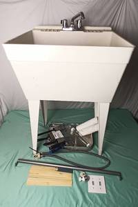 lot 70 image: Mixed Lot w Plastic Freestanding Utility Sink w Faucet and Plumbing, Paint Set, Paint Sticks, Etc. - QV DESCR