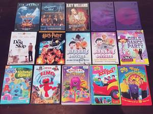 lot 116 image: 15 Pc DVD Set w Elmo, Barney, The Wiggles, Harry Potter, Katt Williams, American Idol, Etc
