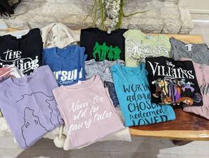 lot 119 image: 13 Pc Womens Clothing (SM) - Including Mavricks, Disney, The Ranch, Etc.