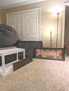 lot 92 image: 6 Pc Set w Panasonic HD Plasma TV TH-42PZ8OU, Plastic Table, Stained Wood Plaque, 41x17.5 Large Kirklands StandKneel Sentiment Plaque, and 2 Standing Lamps - QV DESCR