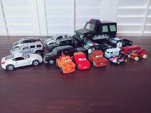 lot 77 image: 16 Pc Hot Wheels & Toy Car Mixed Set w Roblox Jail Break SWAT Vehicle, Mc Donalds Pixar Cars, & Hot Wheels Vehicles like Super Mario Bros Mario Kart Standard Kart, Surfin School Bus, Welly Austin FX4 Taxi, and More