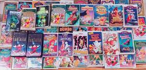 lot 115 image: 47 Pc Disney VHS Set w Fantasia, Winnie the Pooh, Aladin, Toy Story, Dumbo, Brother Bear, Alice in Wonderland, Etc.