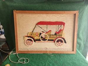 lot 117 image: Large unfinished needlepoint artwork of car