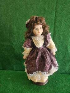 lot 92 image: Collectible doll