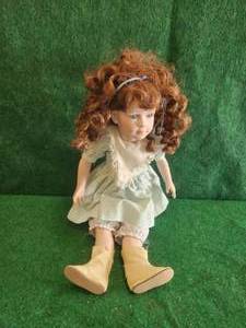 lot 102 image: Collectible doll