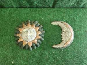lot 104 image: Sun and Moon garden decor.