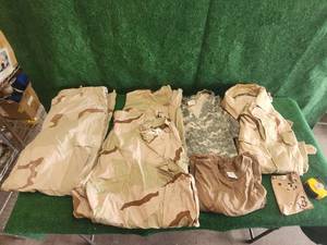 lot 109 image: Selection of camo-military pants and shirts