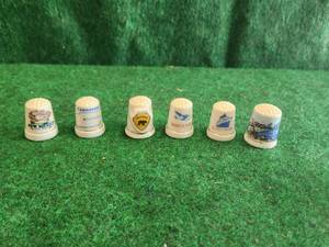 lot 156 image: Selection of collectible thimbles