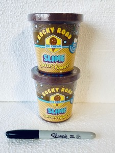 lot 275 image: Lot Of 2 - New Rocky Road Ice Cream Slime Smells Yummy Comes With Plastic Marshmallows - As Shown - Total Retail $30