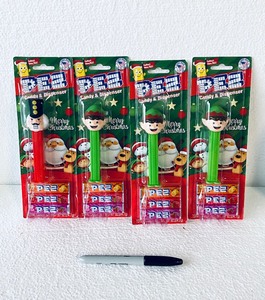 lot 319 image: Lot Of 4 New - PEZ Candy & Dispenser (3) Elf & (1) Nutcracker, .87 Oz Each Box - As Shown - Total Retail $36