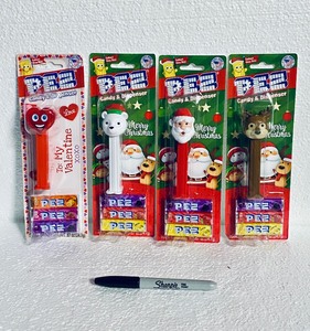 lot 408 image: Lot Of 4 New - PEZ Candy Dispenser With 3 Candy Refills Each, (1) Polarbear, (1) Santa, (1) Reindeer & (1) Heart, .87 Oz Each - As Shown - Total Retail $40