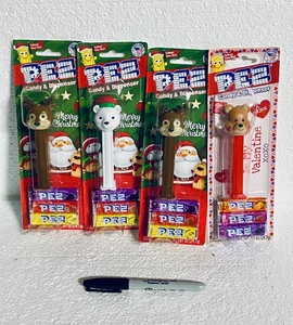 lot 409 image: Lot Of 4 New - PEZ Candy Dispenser With 3 Candy Refills Each, (1) Polarbear, (1) Bear & (2) Reindeer, .87 Oz Each - As Shown - Total Retail $40