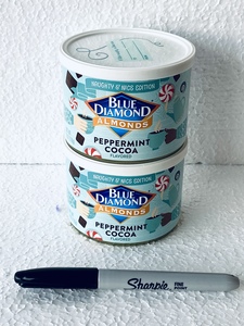 lot 483 image: Lot Of 2 - New Blue Diamond Almonds, Peppermint Cocoa Flavored, Naughty & Nice Edition, 6Oz Per Container - As Shown