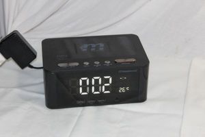 lot 111 image: Wireless Charger and Bluetooth Speaker