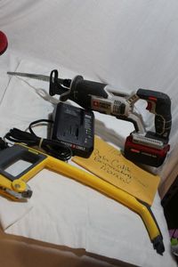 lot 125 image: Porter Cable Cordless Reciprocating Saw with Battery and Charger, and Stanley Hacksaw (no Blade)