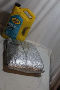 lot 142 image: Antifreeze and Windshield Cover
