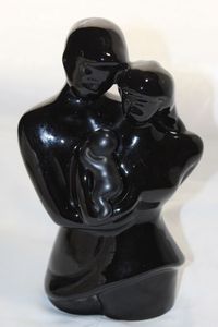 lot 252 image: Father, Mother and Baby ceramic statute