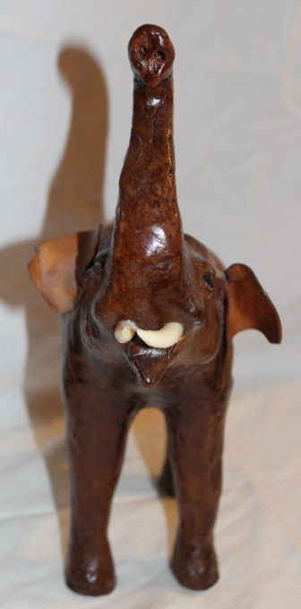 lot 1 image: Vintage Leather Incased Baby Elephant