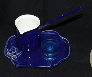 lot 62 image: Blue Cermaic plate, blue metal creamer pitcher and glass candle holder