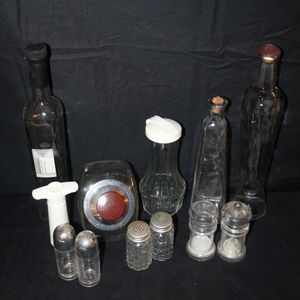 lot 67 image: Vintage bottles and salt and pepper shakers