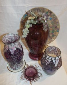 lot 7 image: Mosaic Style Plate, and Candle holders along with a vase and Small candle Holder