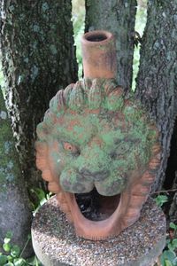lot 54 image: Tarracotta lions head chimney