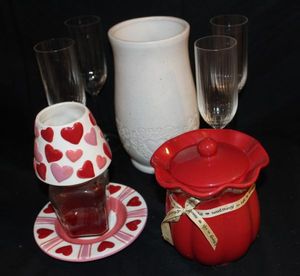 lot 74 image: Red and White dcor and candles, champange glasses