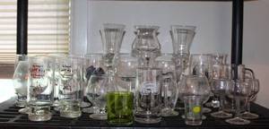 lot 91 image: large selection of glassware, candle holders, glasses, and more