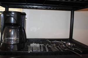 lot 93 image: Coffeemaker and silverware