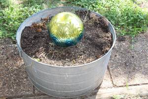 lot 130 image: Planter and Light up globe