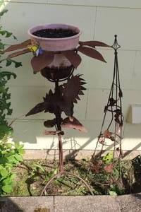 lot 150 image: Metal Yard art and Planter