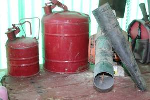 lot 181 image: Large and Small Vintage Metal Gas Cans and Gas Powered Blower